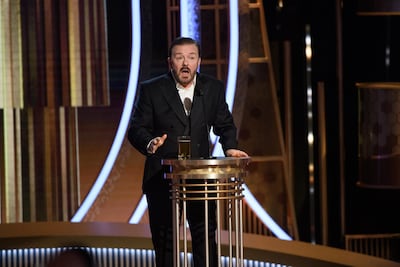 Host Ricky Gervais on stage during the 77th annual Golden Globe Awards