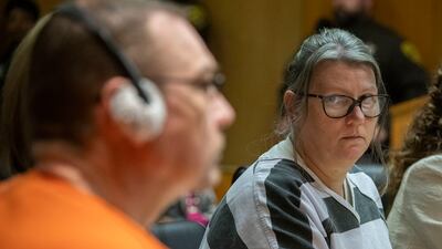Jennifer Crumbley looks at her husband James during their sentencing on four counts of involuntary manslaughter in Pontiac, Michigan. AFP