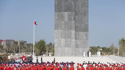 Sheikh Mohammed bin Zayed, Crown Prince of Abu Dhabi and Deputy Supreme Commander of the UAE Armed Forces, observes a moment of silence during a Commemoration Day flag raising ceremony at Wahat Al Karama, a memorial dedicated to the memory of the UAE’s national heroes in honour of their sacrifice and in recognition of their heroism. He is seen with Major General Sheikh Khaled bin Mohammed bin Zayed, Chairman of the UAE State Security Department, Sheikh Khalifa bin Tahnoun bin Mohamed Al Nahyan, Lt General Hamad Al Romaithi, Chief of Staff UAE Armed Forces, Major General Essa Saif Al Mazrouei, Deputy Chief of Staff of the UAE Armed Forces, Mohammed Mubarak Al Mazrouei, Undersecretary of the Crown Prince Court of Abu Dhabi, and others. Philip Cheung / The Crown Prince Court - Abu Dhabi
