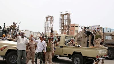 Members of Yemeni Southern Transitional Council shout slogans as they patrol a road during clashes with government forces in Aden, Yemen August 10, 2019. Reuters
