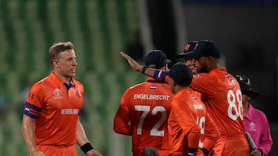 Netherlands' Logan Van Beek, left, after taking the wicket Australia's Cameron Greenof during their warm-up match in Thiruvananthapuram. AP