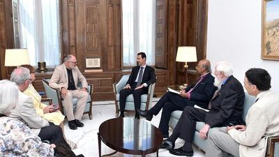 Syrian president Bashar Al Assad met with a visiting British delegation. Louai Beshara / AFP