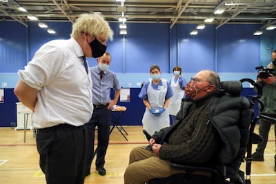 Prime Minister Boris Johnson visits a Covid-19 vaccination centre in Wales. Reuters
