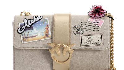 A postcard-inspired design stamped with cute appliqués is ideal for the stylish globetrotter; Dh1,475. Courtesy of Pinko