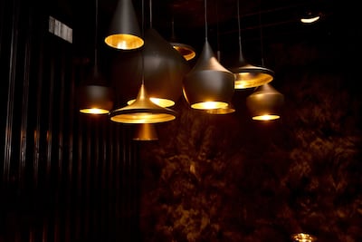 A collection of pendant lamps, including the Beat Fat by Tom Dixon. Getty Images