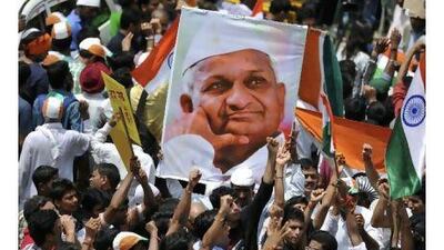 Supporters of Indian social activist Anna Hazare rally outside Tihar Jail in New Delhi on Thursday. A reader urges the government of India to heed to people's voice and stamp out widespread corruption. AFP Photo/Sajjad Hussain