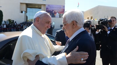 Palestinian President Mahmoud Abbas greets Pope Francis in Ramallah in the West Bank in May 2014. Getty Images