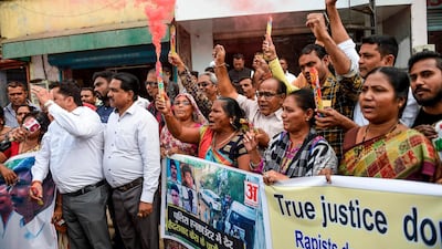 People celebrate in the Indian city of Ahmedabad after four men arrested for gang rape and murder were shot dead on December 6, 2019 by police who said they had attempted to escape. AFP