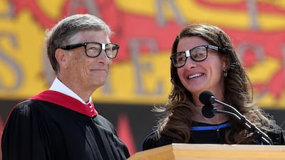 Bill Gates shares the stage with his wife Melinda during the 123rd Stanford commencement ceremony in Stanford, California. AFP