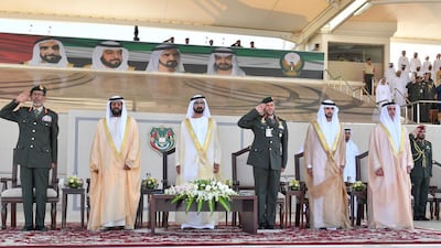 L-R: Sheikh Tahnoun bin Zayed, Ruler’s Representative of the Eastern Region, Sheikh Mohammed bin Rashid, Vice President and Ruler of Dubai, Sheikh Hamdan bin Mohammed, Crown Prince of Dubai, and Sheikh Saif bin Zayed, Deputy Prime Minister and Minister of Interior, stand for the UAE national anthem at a military graduation ceremony in Al Ain. Wam