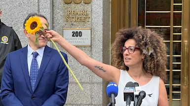 Activist Masih Alinejad outside a court in New York, in October, after a judge sentenced two men to 25 years in jail each over a plot allegedly hatched by Tehran to kill her. AFP