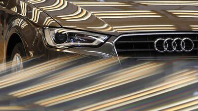 An Audi A3 gets a final check at the production line of the German car manufacturer’s plant in Ingolstadt. Audi reported higher second-quarter operating profit as gains from record luxury-car sales outweighed the impact of spending on technology and foreign expansion. Michaela Rehle / Reuters