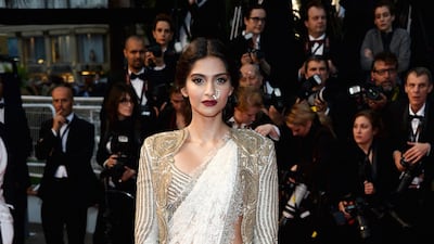 Sari, in Sanskrit, translates as “strip of cloth”, and it usually measures six to eight metres in length. The garment is believed to have originated in the Indus Valley as early as 2800 BC, and today represents the national dress of countries such as India, Nepal, Sri Lanka and Bangladesh. Pictured: Sonam Kapoor at Cannes. Getty