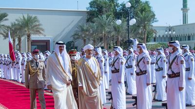 The two men walk down a red carpet at the airport. Photo: @OmanNewsAgency