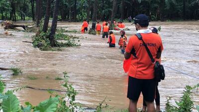 Landslides and flash floods were set off by the storm, which tore through the tip of the northern Philippines overnight on Monday then blew away on Tuesday, officials said. Photo: AP