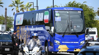The bus carrying Iran's national football team leaves Los Angeles International Airport on June 14, 2026, on the eve of the 2026 World Cup football match against New Zealand. AFP