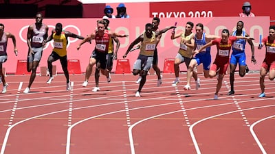 From left: Canada's Andre De Grasse, Ghana's Joseph Paul Amoah, Denmark's Frederik Schou Nielsen, Germany's Lucas Ansah-Peprah, Italy's Filippo Tortu and China's Wu Zhiqiang compete in the men's 4x100m relay heats.