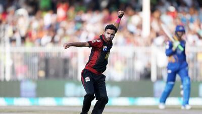 Zafar Gohar of Lahore Qalandars celebrating after taking the wicket of Shoaib Malik of Karachi Kings in the Pakistan Super League T20 match at Sharjah Cricket Stadium in Sharjah. ( Pawan Singh / The National )