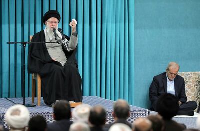 Iran's supreme leader, Ayatollah Ali Khamenei, and President Masoud Pezeshkian during a meeting in Tehran on Saturday. AP