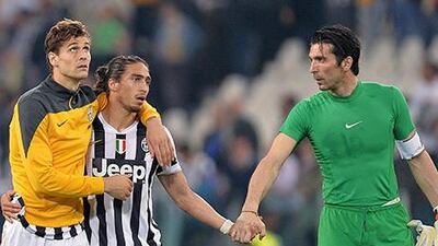 Fernando Llorente, left, scored twice for Juventus on Monday night. Alessandro di Marco / EPA