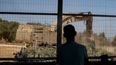 Heavy machinery belonging to the Israeli military uproots olive trees near Arraba, in the Israeli-occupied West Bank, where violence perpetrated by Israeli settlers is rife. Reuters