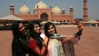 Girls take a selfie after attending Eid al-Fitr prayers, marking the end of Ramadan at the Badshahi Mosque in Lahore, Pakistan. Reuters