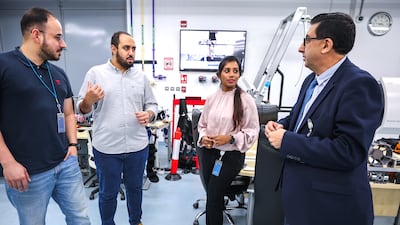 Prof Zweiri with some of his team members, from left, Mohammed Alkrunz, Eslam Mohamed and Aiswarya Babu