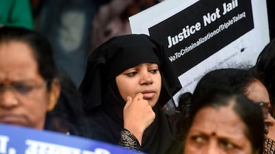 Indian women take part in a protest against the law banning triple talaq. AFP