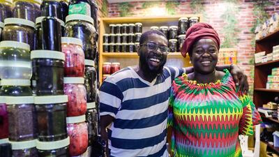 Okanta, left, and his wife Diana own the Diana African Soaps and Creams shop at the Africa Pavilion. They have been operating this shop for nine years