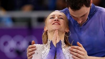 Gold medallists Aljona Savchenko and Bruno Massot of Germany react in the Pair Skating free skating competition final. Damir Sagolj / Reuters