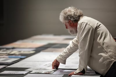 George Arbid examines archival material from Baghdad, Damascus and Tunis at Al Qasimiyah School in Sharjah. Chris Whiteoak / The National