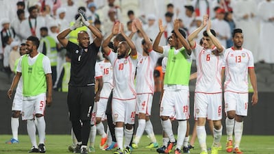 UAE players thank the fans at Mohammed bin Zayed Stadium in Abu Dhabi following their 4-0 thrashing of Hong Kong on Friday night. Abdullateef Al Marzouqi / Al Ittihad
