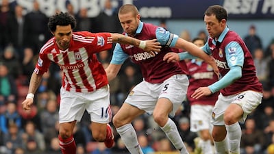 Jermaine Pennant, left during his time at Stoke City, has signed for five-time Singapore champions Tampines Rovers. Ben Stansall / AFP