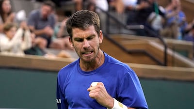 Cameron Norrie reacts to winning a point against Nikoloz Basilashvili. AP Photo