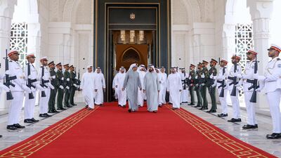 Sheikh Mohammed and Sheikh Mansour with ministers at Qasr Al Watan, where the Cabinet meeting was held.