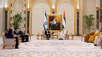 Sheikh Mohamed bin Zayed and the Israeli delegation talk at Qasr Al Watan. Mohamed Al Hammadi / Ministry of Presidential Affairs