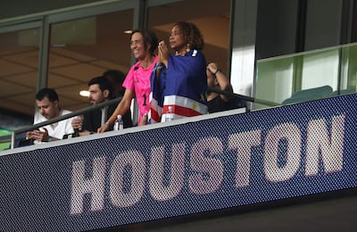 Ana Candida Evora, mother of goalkeeper Vozinha, cheers in the stands during the match between Cape Verde and Saudi Arabia at Houston Stadium. Getty Images
