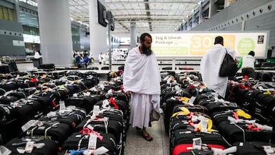 Muslim worshippers check their luggage at the Hajj terminal of the King Abdulaziz international airport in Jeddah, Saudi Arabia. Mast Irham / EPA