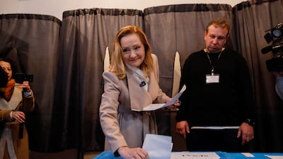 Leader of the opposition Save Romania Union (USR) Elena Lasconi casts her vote in Campulung. Reuters