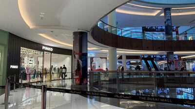 The Dubai Mall was welcoming about 100,000 visitors in November compared to pre-Covid numbers of 250,000 daily. Pawan Singh / The National