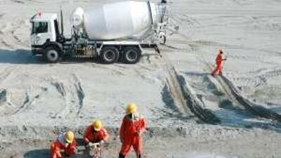 The price of cement has tumbled along with steel, bringing relief to the construction industry.