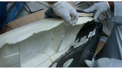 Customs officers in Dubai found three kilograms of opium stuffed inside the seat compartment of a motorcycle, in a shipment of spare parts which had arrived from an African location en route to Asia. Courtesy Dubai Customs