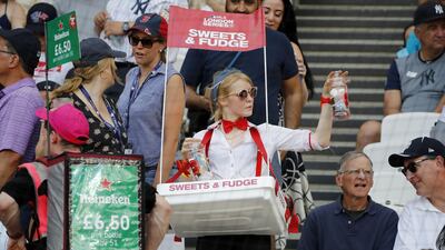 A vendor sells sweets during the first of a two-game series between the New York Yankees and the Boston Red Sox at London Stadium in Queen Elizabeth Olympic Park, east London. As Major League Baseball prepares to make history in London, New York Yankees manager Aaron Boone and Boston Red Sox coach Alex Cora are united in their desire to make the ground-breaking trip memorable on and off the field. AFP