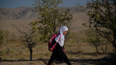 A child on her way to school on the outskirts of Herat. Girls have returned to some secondary schools in a northern province of Afghanistan, Taliban officials and teachers said. AFP