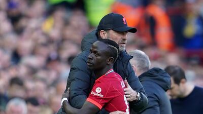 Liverpool manager Jurgen Klopp hugs Sadio Mane. AP