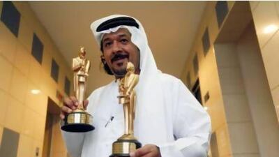 "The Merlin is like the Oscars of magic," says the Emirati magician Muntaser Al Mansouri, with his trophies. Satish Kumar / The National