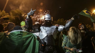 Supporters of Jair Bolsonaro celebrate his victory in Rio de Janeiro. EPA