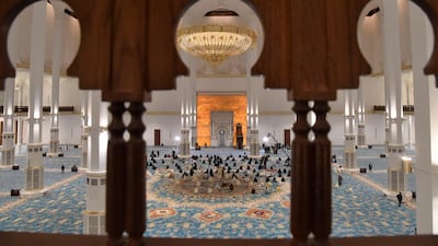 Algerian worshippers pray at the Great Mosque, also known as Djamaa Al Djazair, during its inauguration in the Algerian capital Algiers on October 28, 2020. AFP