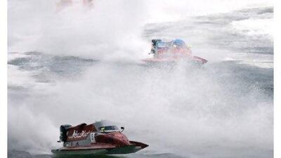 Competitors whip up the waves during last year's powerboat championships in the emirate. Jeff Topping / The National