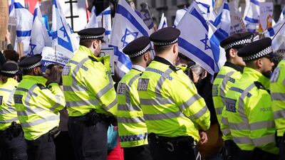 Demonstrators protest on Whitehall in London following Mr Netanyahu's visit. PA